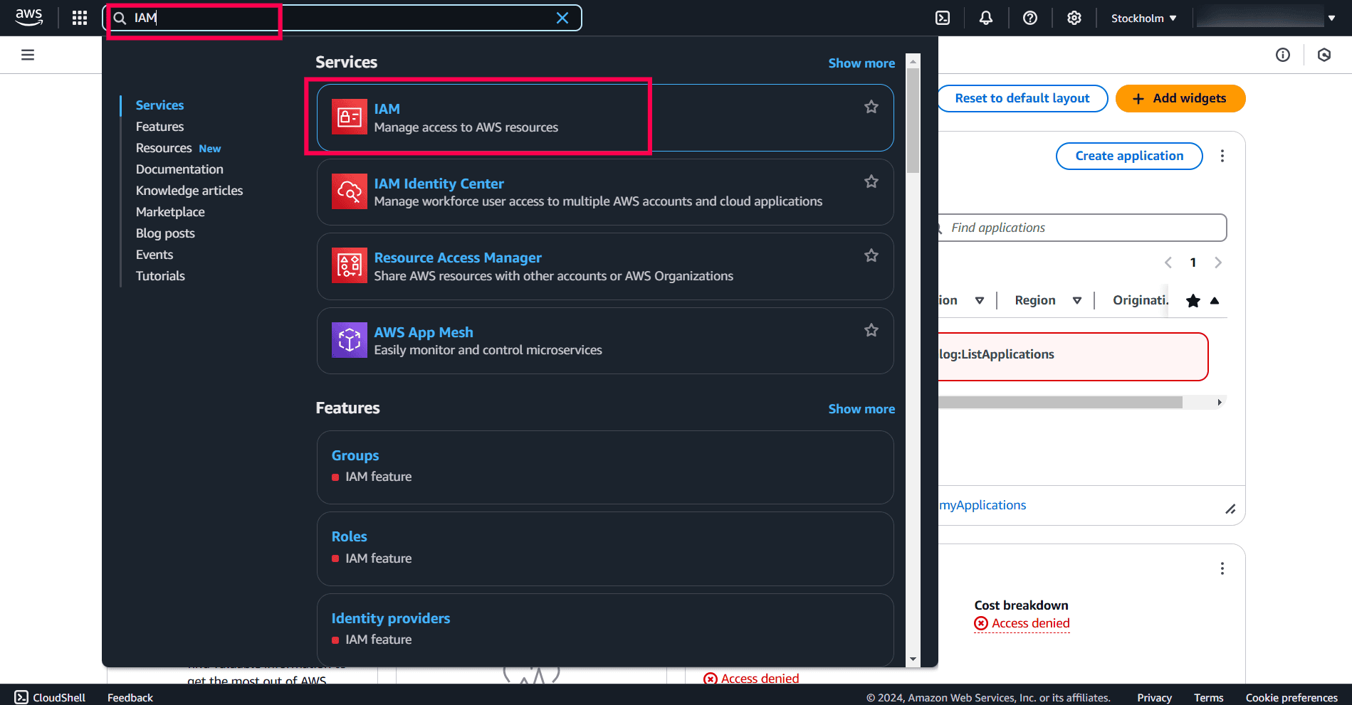 Navigating to the IAM service in the AWS Management console.